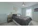 Tranquil bedroom with a macrame wall hanging, neutral palette, and a comfortable bed at 505 Spanish Wells Road Rd, Summerville, SC 29486