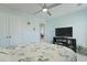 Cozy bedroom featuring a floral bedspread, television and ensuite bathroom at 505 Spanish Wells Road Rd, Summerville, SC 29486
