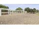 Open-air common area featuring a pergola, benches, and meticulously maintained grounds, perfect for social gatherings at 505 Spanish Wells Road Rd, Summerville, SC 29486