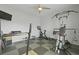 An interior exercise room with workout equipment, neutral walls, and cushioned flooring at 505 Spanish Wells Road Rd, Summerville, SC 29486