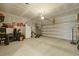 Spacious garage providing ample room for parking and storage, complete with shelving units and tools at 505 Spanish Wells Road Rd, Summerville, SC 29486