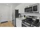 Modern kitchen with stainless steel appliances, including a range and microwave at 505 Spanish Wells Road Rd, Summerville, SC 29486