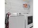 Laundry room with a washer, dryer, and shelving at 505 Spanish Wells Road Rd, Summerville, SC 29486