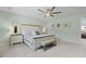 Spacious main bedroom featuring stylish furniture, decor, and fan light at 505 Spanish Wells Road Rd, Summerville, SC 29486