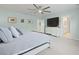 Beautiful main bedroom with a TV, fan light, and ensuite bathroom at 505 Spanish Wells Road Rd, Summerville, SC 29486