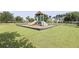 Beautiful community playground with slides and mulch and well-kept lawn at 505 Spanish Wells Road Rd, Summerville, SC 29486