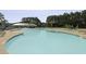 Community pool with splash area and lounge chairs, creating a perfect spot for Gathering and relaxation at 505 Spanish Wells Road Rd, Summerville, SC 29486