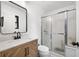 Bathroom showcasing a modern vanity, sleek mirror, and glass-enclosed shower at 518 Woodward Blvd, Summerville, SC 29483