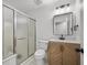 Bathroom with modern vanity, frosted glass shower and tile flooring at 518 Woodward Blvd, Summerville, SC 29483