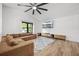 Bright living room with vaulted ceiling, a comfortable sectional sofa, large rug, and a TV at 518 Woodward Blvd, Summerville, SC 29483