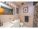 Standard bathroom with a single sink vanity and a vintage-style bathtub at 5302 Helene Dr, North Charleston, SC 29418