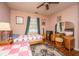 Cozy bedroom with wood floors, ceiling fan, and coordinating bed frames at 5302 Helene Dr, North Charleston, SC 29418