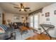 Cozy living room featuring ceiling fan, comfortable seating, and access to the outdoor area at 5302 Helene Dr, North Charleston, SC 29418