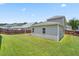 Fenced backyard with lush green grass at 536 Man O War Ln, Moncks Corner, SC 29461