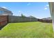 Well-maintained backyard with a sturdy wooden fence providing privacy at 536 Man O War Ln, Moncks Corner, SC 29461