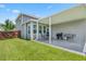 A view of the home's backyard showing patio and green lawn at 536 Man O War Ln, Moncks Corner, SC 29461