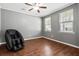 Bedroom with neutral-toned walls and hardwood flooring at 536 Man O War Ln, Moncks Corner, SC 29461