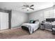 Bedroom featuring neutral walls, a queen-sized bed, and a work desk at 536 Man O War Ln, Moncks Corner, SC 29461