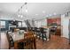 Open-concept kitchen featuring granite countertops, stainless steel appliances and an eat in dining area at 536 Man O War Ln, Moncks Corner, SC 29461