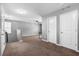 Loft space with carpet and two bright-white doors at 536 Man O War Ln, Moncks Corner, SC 29461