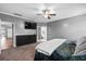 Cozy main bedroom with TV, ceiling fan and ensuite bathroom at 536 Man O War Ln, Moncks Corner, SC 29461