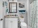 Bathroom featuring a toilet, vanity with granite counters, and starfish shower curtain at 554 Tidewater Chase Ln, Summerville, SC 29486