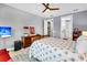 Bedroom with wood dresser, ceiling fan, and ensuite bathroom at 554 Tidewater Chase Ln, Summerville, SC 29486