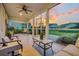 Screened-in porch with a view of sunset, perfect for relaxation and entertaining outdoors at 554 Tidewater Chase Ln, Summerville, SC 29486