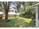 Private backyard with mature trees and a well-maintained lawn at 623 Bay Tree Ct, Mount Pleasant, SC 29464