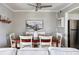 Dining area with seating for six, overhead lighting and white trim at 623 Bay Tree Ct, Mount Pleasant, SC 29464