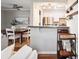 Kitchen pass-through with stone counter, breakfast bar, and stainless steel appliances at 623 Bay Tree Ct, Mount Pleasant, SC 29464
