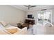 Inviting living room with comfortable seating, a ceiling fan and a television at 623 Bay Tree Ct, Mount Pleasant, SC 29464