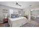 Serene main bedroom with a calming color palette, mirrorred closet doors and ample natural light at 623 Bay Tree Ct, Mount Pleasant, SC 29464