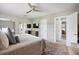 Spacious main bedroom with mirrorred closet doors, a ceiling fan, and multiple entryways for easy access at 623 Bay Tree Ct, Mount Pleasant, SC 29464