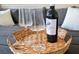 Close-up of a bottle of wine and glasses on an outdoor porch, perfect for relaxing evenings at 623 Bay Tree Ct, Mount Pleasant, SC 29464
