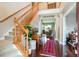 Grand foyer with hardwood floors, a staircase, and views into the living area, creating a welcoming entrance at 644 Grassy Hill Rd, Summerville, SC 29483