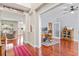 Spacious home office with hardwood floors, complemented by a nearby living area for flexible living at 644 Grassy Hill Rd, Summerville, SC 29483