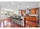 Modern kitchen with hardwood floors, stainless steel appliances, and a breakfast bar that seats four at 644 Grassy Hill Rd, Summerville, SC 29483