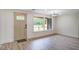 Entryway with a sidelight window and updated light fixture provides natural lighting at 670 Dupre Rd, McClellanville, SC 29458