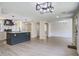 Spacious kitchen featuring a large island and contemporary lighting at 670 Dupre Rd, McClellanville, SC 29458