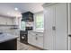 Updated kitchen with stainless steel appliances and ample cabinet space at 670 Dupre Rd, McClellanville, SC 29458
