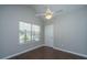 Bedroom with vaulted ceiling, ceiling fan, hardwood floors and natural light from a window at 687 Ponderosa Dr, Charleston, SC 29414