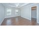 Bedroom with tray ceilings, crown molding, bright windows and access to closet at 687 Ponderosa Dr, Charleston, SC 29414