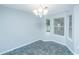 Well-lit dining room with tile flooring and ample windows at 687 Ponderosa Dr, Charleston, SC 29414