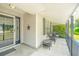 Inviting covered front porch with comfortable seating and charming details at 687 Ponderosa Dr, Charleston, SC 29414