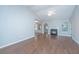 Open living room showcasing fireplace, wood floors, and neutral paint at 687 Ponderosa Dr, Charleston, SC 29414