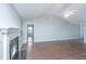 Bright living room featuring a fireplace, wood floors, and neutral paint at 687 Ponderosa Dr, Charleston, SC 29414