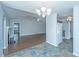 Open-concept space with fireplace, flowing through the dining and kitchen areas at 687 Ponderosa Dr, Charleston, SC 29414