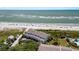 Coastal condo complex featuring direct beach access and ocean views with vibrant blue accents at 7 Beach Club Villas, Isle of Palms, SC 29451