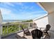 A beautiful balcony overlooking the ocean with seating for four at 7 Beach Club Villas, Isle of Palms, SC 29451